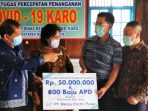 Pemkab Karo Terima Bantuan PT WEP Berupa 800 APD dan Uang Rp50 Juta