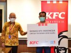 KFC Indonesia Serahkan Donasi Hasil Program Bucket For Given, Bucket For Good ke Yayasan 1000 Guru